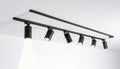 Modern Black Track Lighting on a White Ceiling Royalty Free Stock Photo