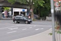 Modern black Volkswagen Tiguan SUV driving on an intersection in Bochum, Germany