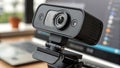 Modern black webcam mounted on a laptop stand Royalty Free Stock Photo