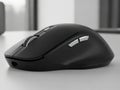 Modern black wireless mouse on desk Royalty Free Stock Photo