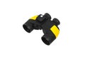 Modern black and yellow waterproof and unsinkable marine binoculars.. Surveillance device. Device for viewing at a distance. Royalty Free Stock Photo