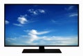 Modern blank flat screen TV set, LCD Television isolated on white background,4K display with blue sky and clouds.Tv media concept. Royalty Free Stock Photo