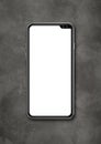 Modern blank smartphone mockup on concrete desk. 3D render Royalty Free Stock Photo