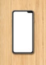 Modern blank smartphone mockup on wooden desk. 3D render