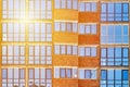modern blue glass windows wall of office building, sunlight effect Royalty Free Stock Photo