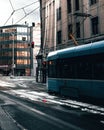 modern blue tram on tracks near tram stop in the streets of Ostrava waiting on a red traffic light Royalty Free Stock Photo