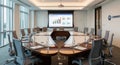 Modern boardroom with projection screen and oval table Royalty Free Stock Photo