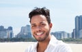 Modern brazilian man with skyline in the background