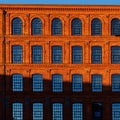 Modern brick and glass facade of the office building. Royalty Free Stock Photo