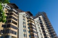 Modern brick multistory house on deep blue sky bac Royalty Free Stock Photo