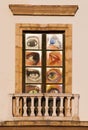 Modern spanish window with eyes decoration Royalty Free Stock Photo