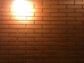 Modern brick wall, red brick wall or brown brick wall textur for background.have one light