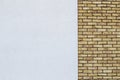 Modern brick wall with white painted plaster background Royalty Free Stock Photo