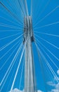 Modern bridge pylon against a blue sky. Detail of the multi-span Cable-stayed suspension Alex Fraiser Bridge BC Royalty Free Stock Photo