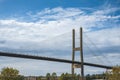 Modern bridge pylon against blue sky. Multi-span cable-stayed bridge. White cable-stayed suspension Alex Fraser Bridge Royalty Free Stock Photo