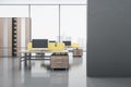 Modern bright coworking office interior with clean mock up place on wall, yellow partition, panoramic windows with city view, Royalty Free Stock Photo