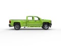 Modern bright green pickup truck - side view