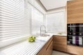 Kitchen with white window blinds Royalty Free Stock Photo