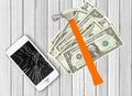 Modern broken mobile phone, hammer and dollars on white Royalty Free Stock Photo