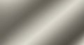 Brushed metal texture background with diagonal light reflection and subtle gradient effect Royalty Free Stock Photo