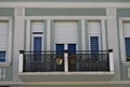 Modern building balcony with new windows and fence