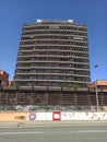 A modern building in Bologna Italy and a wall full of murales