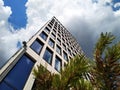 Modern building, bottom view. multi-storey office building, skyscraper. glass and concrete is a trend of modern Royalty Free Stock Photo