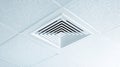 Modern building ceiling air vent with concentric square design Royalty Free Stock Photo