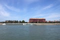Modern building and cruiser on Danube river Royalty Free Stock Photo