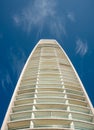 Modern building details against blue cloudy sky Royalty Free Stock Photo