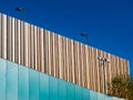 Modern building with different textures with bright blue sky Royalty Free Stock Photo
