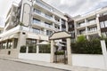 Modern Building Exterior. Facade of a Modern Apartment Building. Vacation Complex Hotel Building, With Stone Tiling Facade