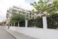 Modern Building Exterior. Facade of a Modern Apartment Building. Vacation Complex Hotel Building, With Stone Tiling Facade