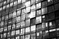 Modern building facade , office windows sky reflection Royalty Free Stock Photo