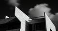 Modern building facade with sharp, angular concrete structures, featuring define Royalty Free Stock Photo