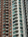 Modern building facade with windows and balconies Royalty Free Stock Photo