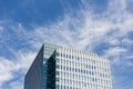 Modern building facede with rectangle and square windows form with clear blue sky with cloud in Sapporo at Hokkaido. Royalty Free Stock Photo