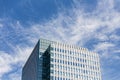 Modern building facede with rectangle and square windows form with clear blue sky with cloud in Sapporo at Hokkaido.