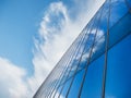Modern building Glass facade with Sky reflection Architecture details