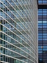 The modern building from glass and steel. Reflections in a glass facade