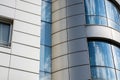 Modern building glass wall with sky and cloud reflection in windows Royalty Free Stock Photo