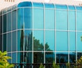 Modern building with glazed facade and curved corners Royalty Free Stock Photo