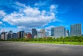 Modern building with green Zen garden on blue sky background in Royalty Free Stock Photo