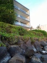 Riverside house with nice rock view Royalty Free Stock Photo