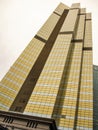 Modern building. Modern office building with facade of glass wall with abstract texture Royalty Free Stock Photo