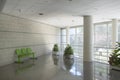 Modern building waiting area with metallic chairs