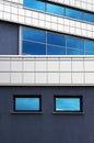 Modern building. Windows with reflection of blue sky Royalty Free Stock Photo