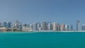 Modern buildings in Abu Dhabi skyline with mall and beach. Royalty Free Stock Photo