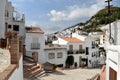 Modern buildings along narrow street in Frigiliana - Spanish white village Andalusia