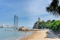 Modern buildings and ancient statues on the bay